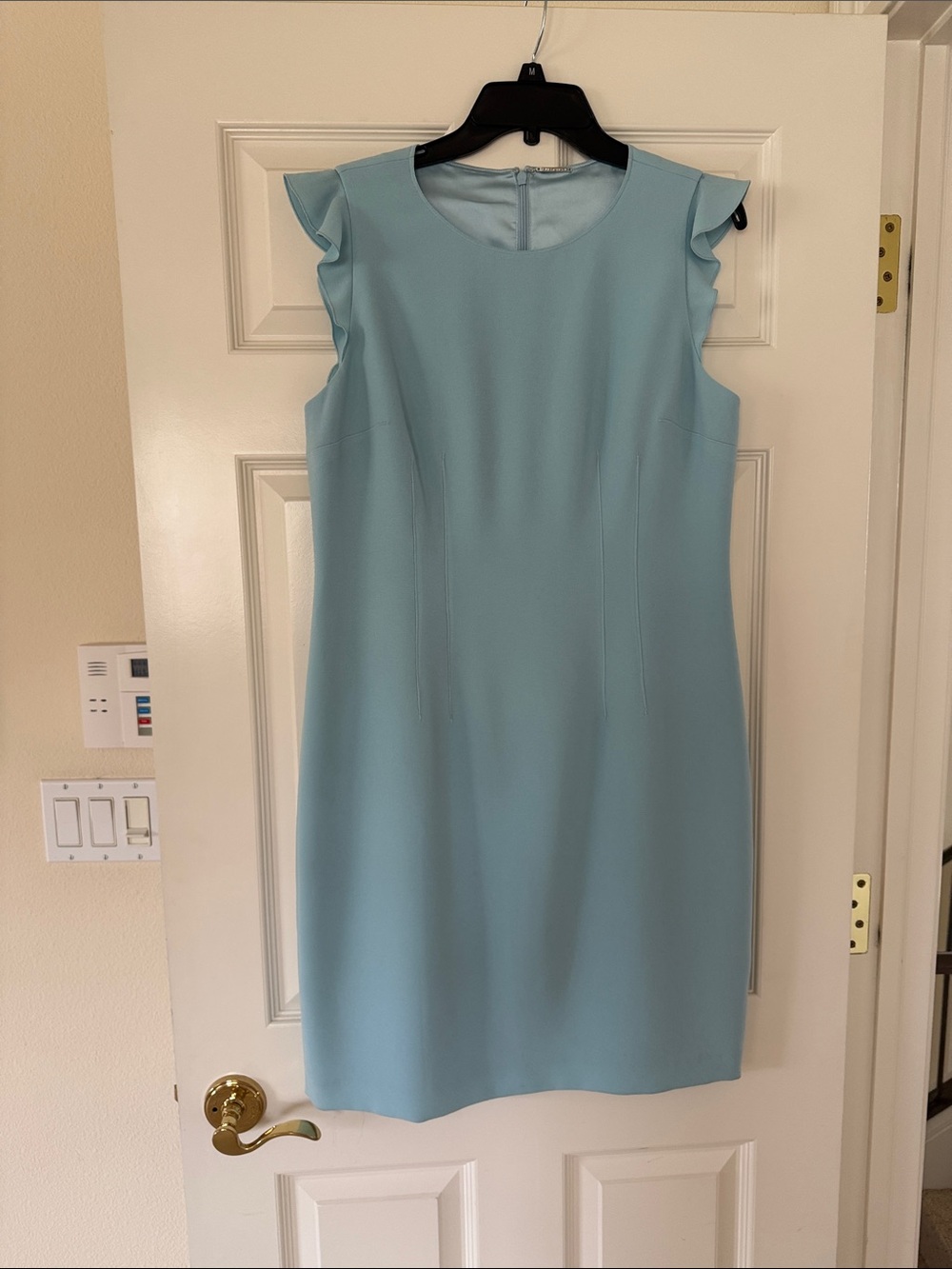 Sleeveless Light Blue Shift Dress with Ruffle Shoulders

Brand elie tahari